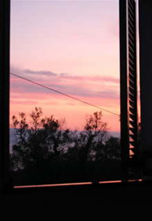 View of the sunset from the bedroom window
